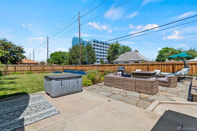 1390 Emporia St, Aurora, CO 80010 - fenced backyard with outdoor lounge area, a patio area, and area for grilling