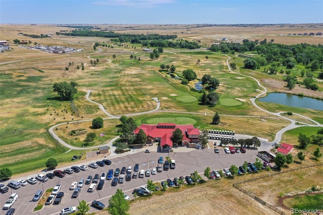 bird's eye view with a water view and a rural view