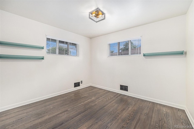 7625 Turner Dr, Denver, CO 80221 - unfurnished room with healthy amount of natural light and dark wood-style floors
