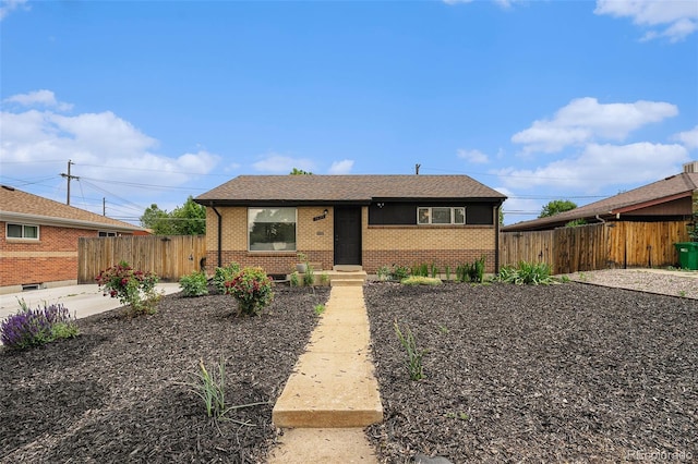 7625 Turner Dr, Denver, CO 80221 - view of front of home featuring brick siding
