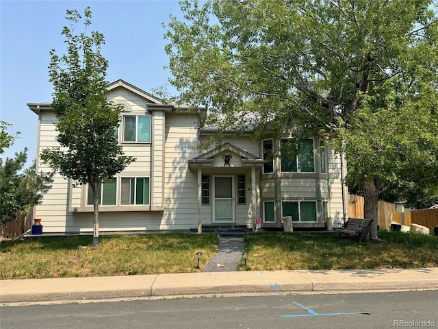 view of front of home with a front lawn