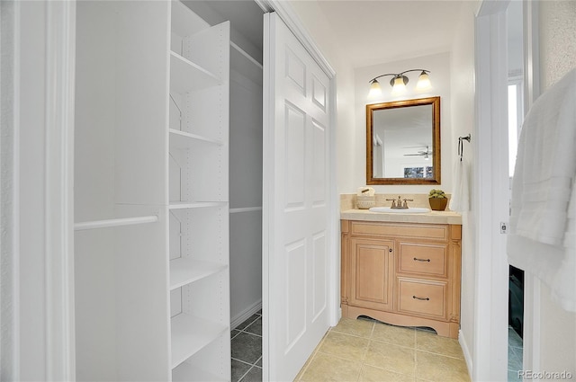 bathroom featuring vanity and tile patterned flooring