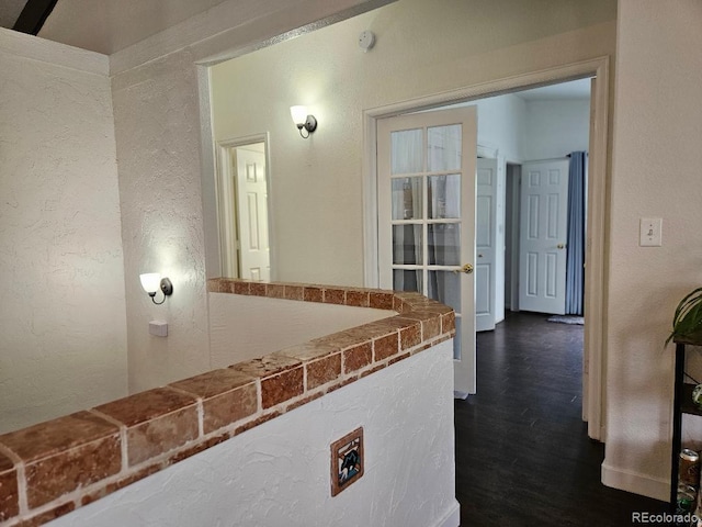 34358 Goldenrod Cir, Kiowa, CO 80117 - hallway with a textured wall and dark wood-style floors
