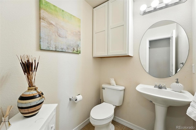 2567 Cutters Cir Unit 101, Castle Rock, CO 80108 - bathroom featuring toilet and baseboards
