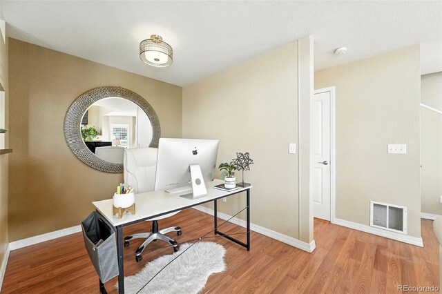 2567 Cutters Cir Unit 101, Castle Rock, CO 80108 - office with baseboards and wood finished floors