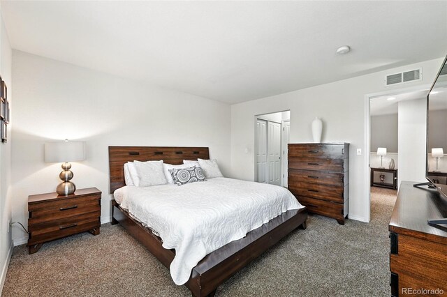 2567 Cutters Cir Unit 101, Castle Rock, CO 80108 - carpeted bedroom featuring baseboards and a closet