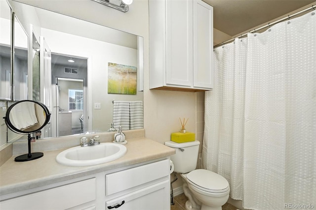 2567 Cutters Cir Unit 101, Castle Rock, CO 80108 - bathroom featuring toilet and vanity