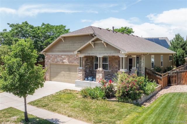 123 Blue Stem St, Brighton, CO 80601 - craftsman-style home with concrete driveway, a garage, covered porch, a shingled roof, and stone siding