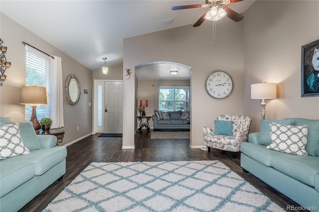 123 Blue Stem St, Brighton, CO 80601 - living area with ceiling fan, wood finished floors, arched walkways, and high vaulted ceiling
