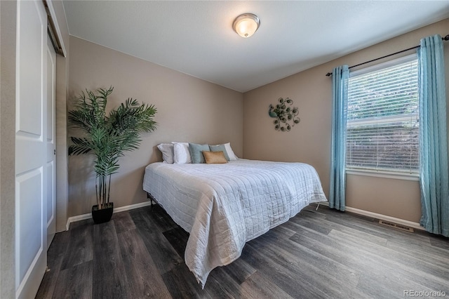 123 Blue Stem St, Brighton, CO 80601 - bedroom with wood finished floors and baseboards