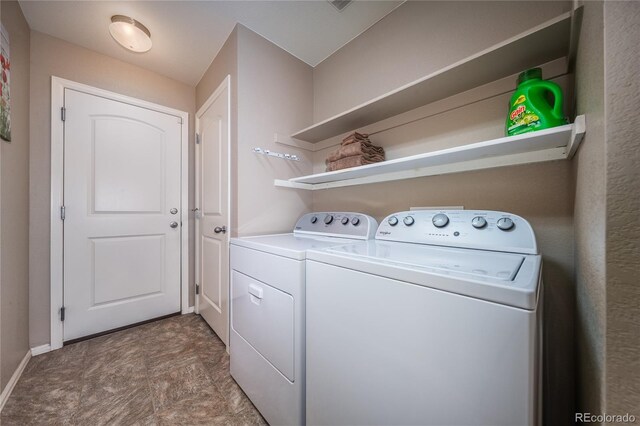 123 Blue Stem St, Brighton, CO 80601 - laundry room featuring washer and dryer and baseboards