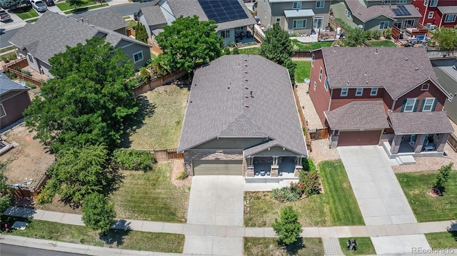 123 Blue Stem St, Brighton, CO 80601 - aerial perspective of suburban area