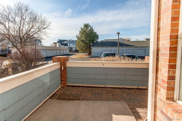 view of patio / terrace with a balcony