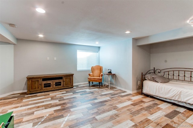 interior space with recessed lighting, light wood-type flooring, and baseboards