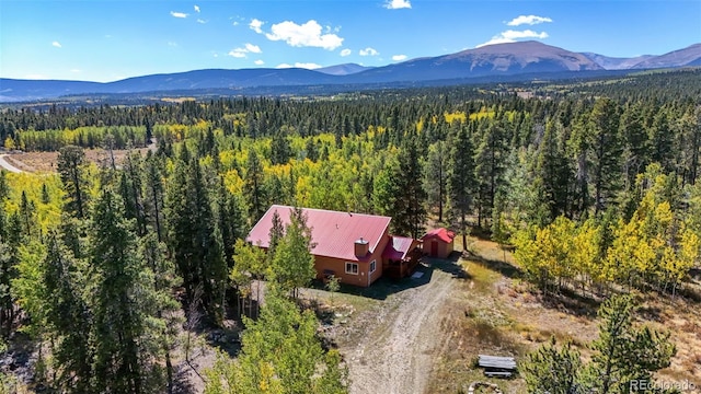 drone / aerial view featuring a mountain view