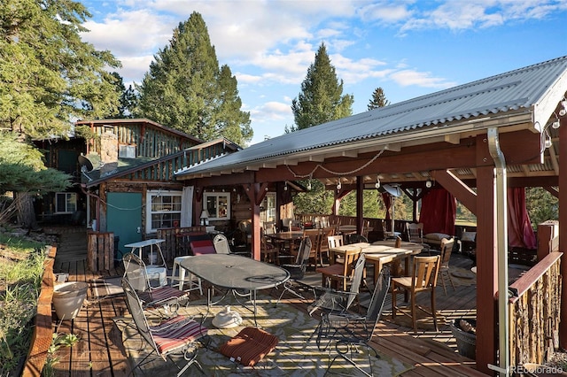 wooden deck featuring a gazebo