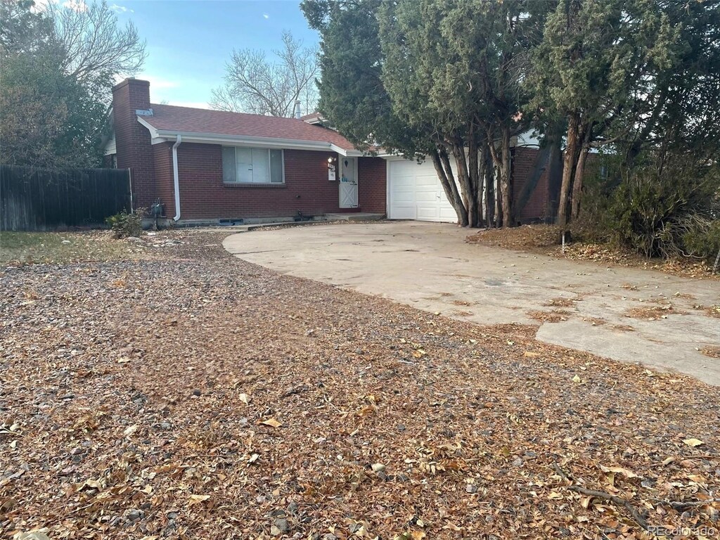 ranch-style home with a garage