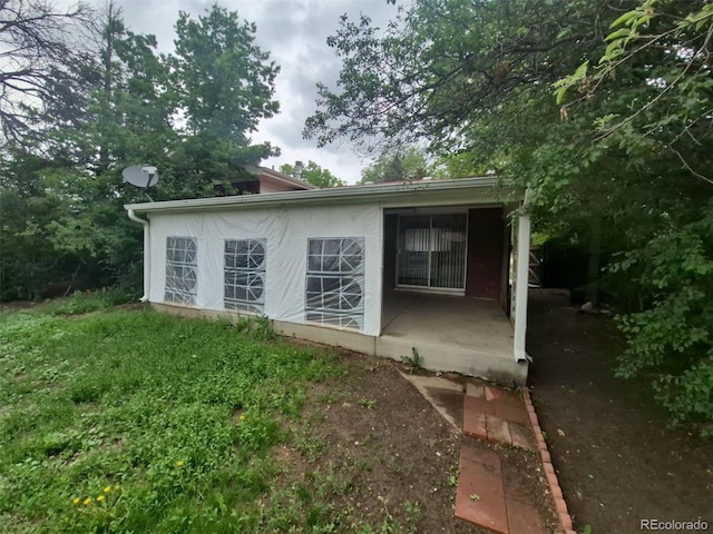387 Tucson St, Aurora, CO 80011 - view of rear view of house