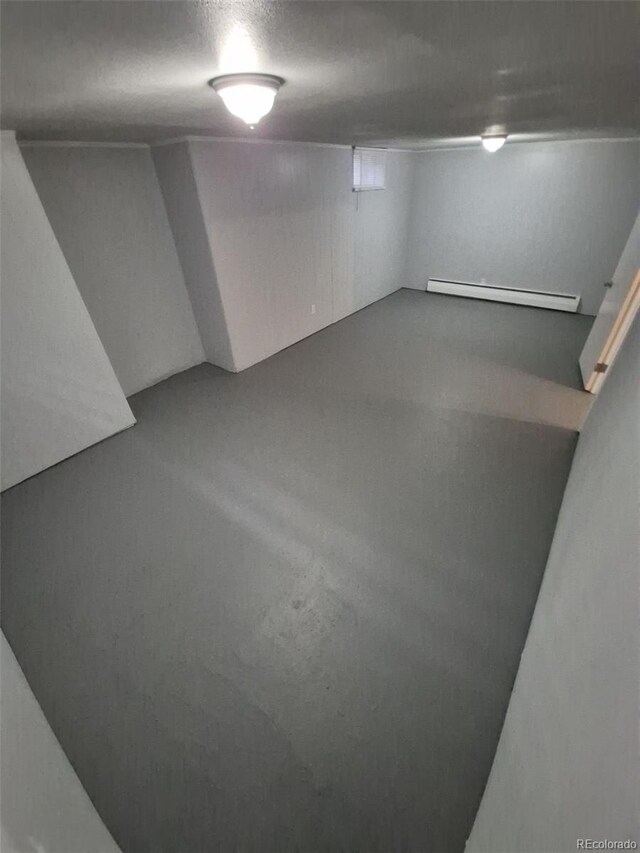 387 Tucson St, Aurora, CO 80011 - finished basement featuring baseboard heating