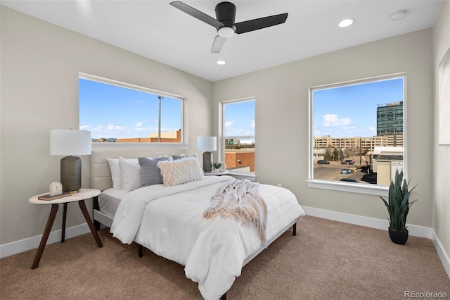 carpeted bedroom with recessed lighting, baseboards, and ceiling fan