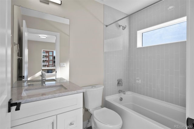 full bath featuring shower / bath combination, toilet, and vanity