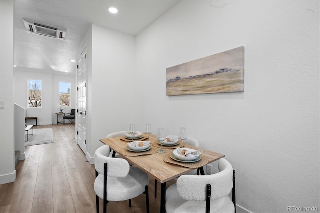 dining area featuring light hardwood / wood-style flooring