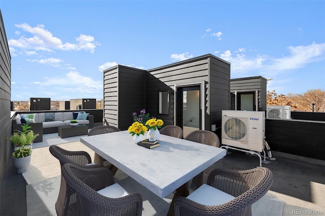 view of patio featuring ac unit and an outdoor living space