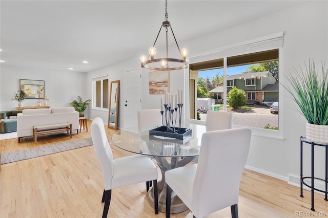 4650 S Idalia St, Aurora, CO 80015 - dining room with a chandelier, wood finished floors, recessed lighting, and baseboards