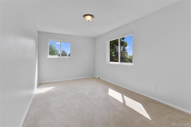 4650 S Idalia St, Aurora, CO 80015 - unfurnished room with healthy amount of natural light, carpet, and baseboards