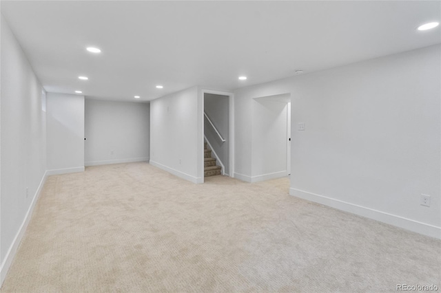 4650 S Idalia St, Aurora, CO 80015 - finished basement featuring recessed lighting, stairway, light carpet, and baseboards