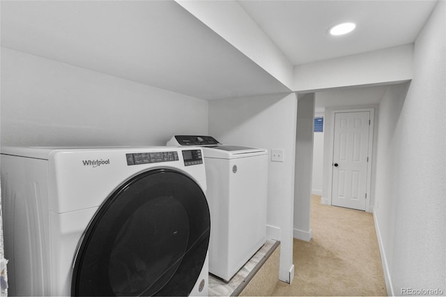 4650 S Idalia St, Aurora, CO 80015 - washroom featuring separate washer and dryer, light carpet, and baseboards