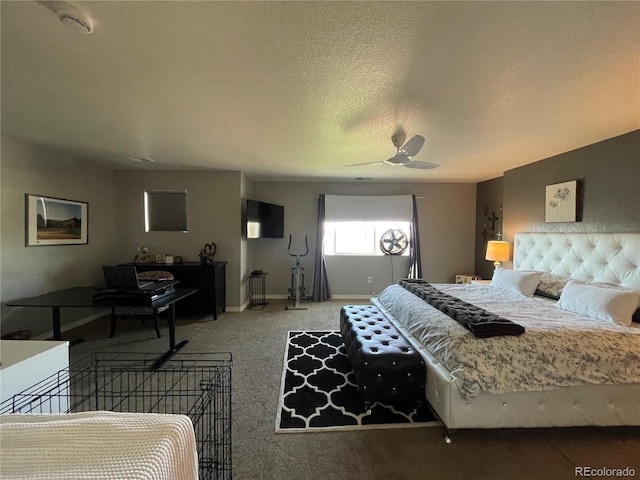 bedroom featuring a textured ceiling, carpet floors, and ceiling fan