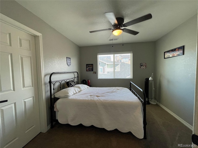 carpeted bedroom with ceiling fan