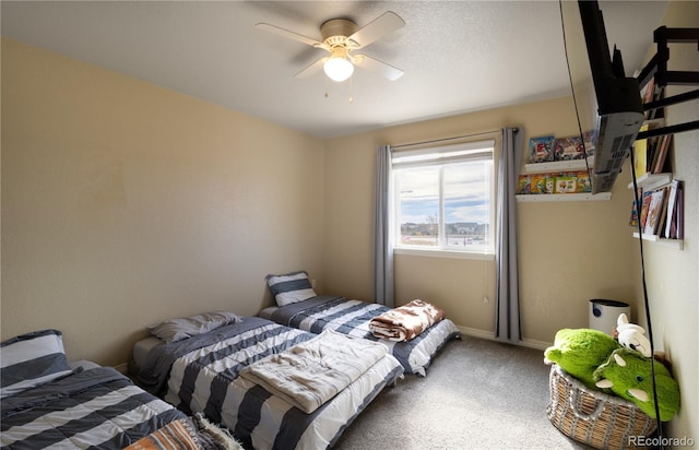 carpeted bedroom featuring ceiling fan