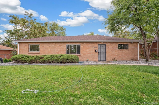 1330 Oak Pl, Thornton, CO 80229 - single story home with brick siding