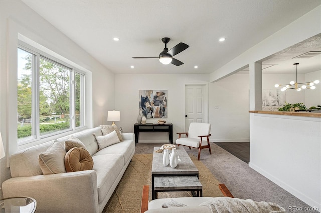1330 Oak Pl, Thornton, CO 80229 - living area with a chandelier, baseboards, a ceiling fan, recessed lighting, and carpet flooring