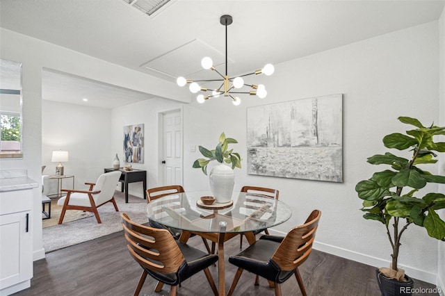 1330 Oak Pl, Thornton, CO 80229 - dining room with dark wood finished floors, baseboards, and a chandelier
