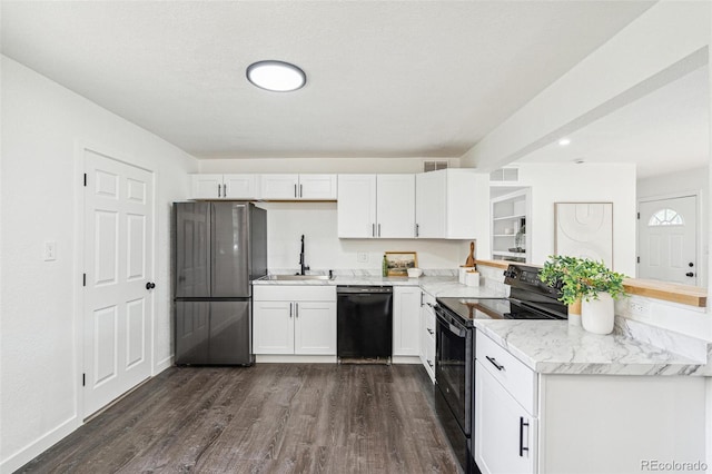 1330 Oak Pl, Thornton, CO 80229 - kitchen with black appliances, a sink, dark wood-style floors, white cabinetry, and recessed lighting