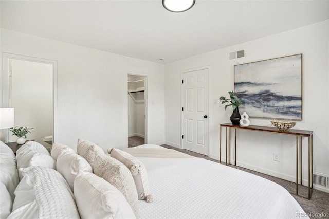 1330 Oak Pl, Thornton, CO 80229 - carpeted bedroom featuring baseboards and a spacious closet