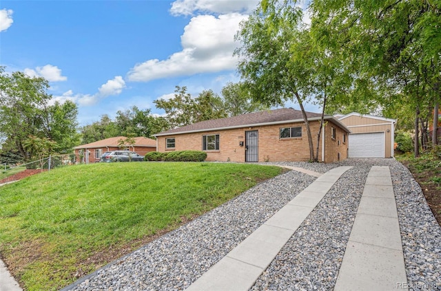 1330 Oak Pl, Thornton, CO 80229 - ranch-style home with brick siding, driveway, and a garage