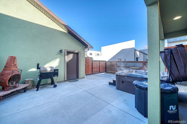 view of patio featuring a hot tub