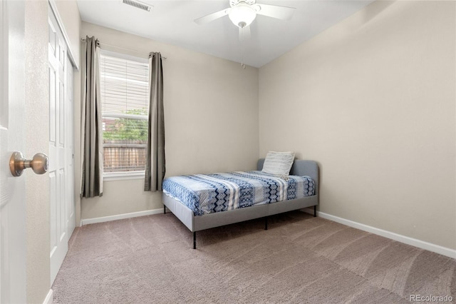 bedroom featuring carpet flooring and a ceiling fan