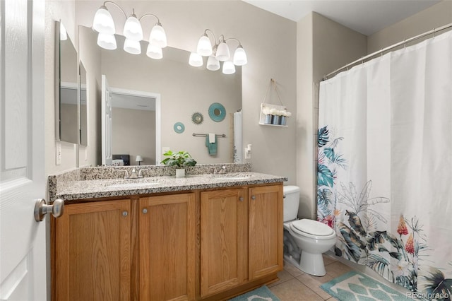 bathroom featuring double vanity, tile patterned flooring, and a shower with curtain