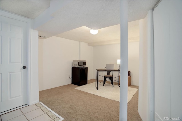 interior space with a textured ceiling