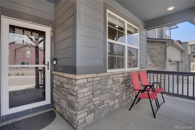 9836 Banner Peak St, Littleton, CO 80125 - entrance to property featuring a porch and stone siding