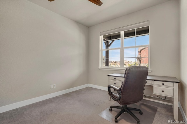 9836 Banner Peak St, Littleton, CO 80125 - home office featuring a ceiling fan, baseboards, and dark carpet