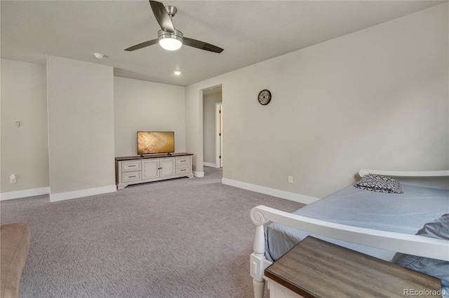 9836 Banner Peak St, Littleton, CO 80125 - bedroom featuring light colored carpet, baseboards, and ceiling fan