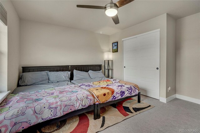 9836 Banner Peak St, Littleton, CO 80125 - bedroom with carpet floors, baseboards, ceiling fan, and a closet