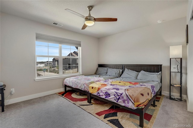 9836 Banner Peak St, Littleton, CO 80125 - bedroom with carpet flooring, baseboards, and ceiling fan