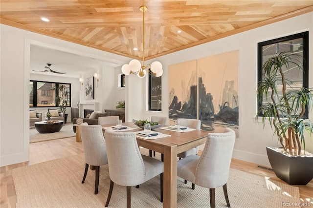 2610 N Monroe St, Denver, CO 80205 - dining room featuring baseboards, wood finished floors, wooden ceiling, recessed lighting, and crown molding